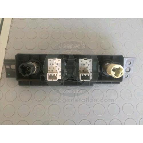 Sede interruttori nebbia plancia sbrina e tergi lunotto retronebbia + sede accendi sigaro Jeep XJ Cherokee '99 - 56007451 