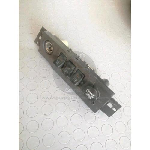 Sede interruttori nebbia plancia sbrina e tergi lunotto retronebbia + sede accendi sigaro Jeep XJ Cherokee '99 - 56007451 